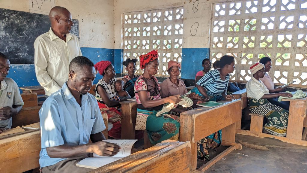 Adult Literacy participants in Vyeyo work on their English lessons.