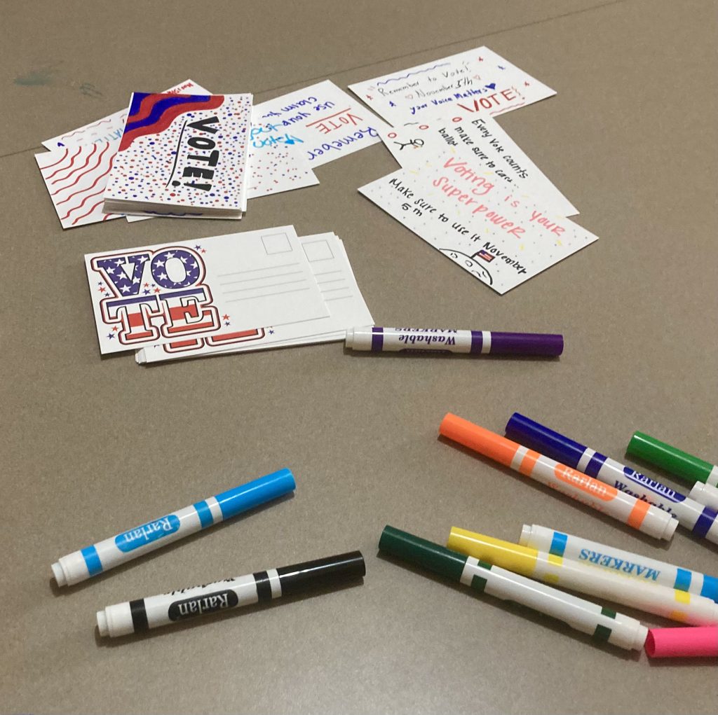 In Detroit, students put together postcards encouraging their community to get out and vote!