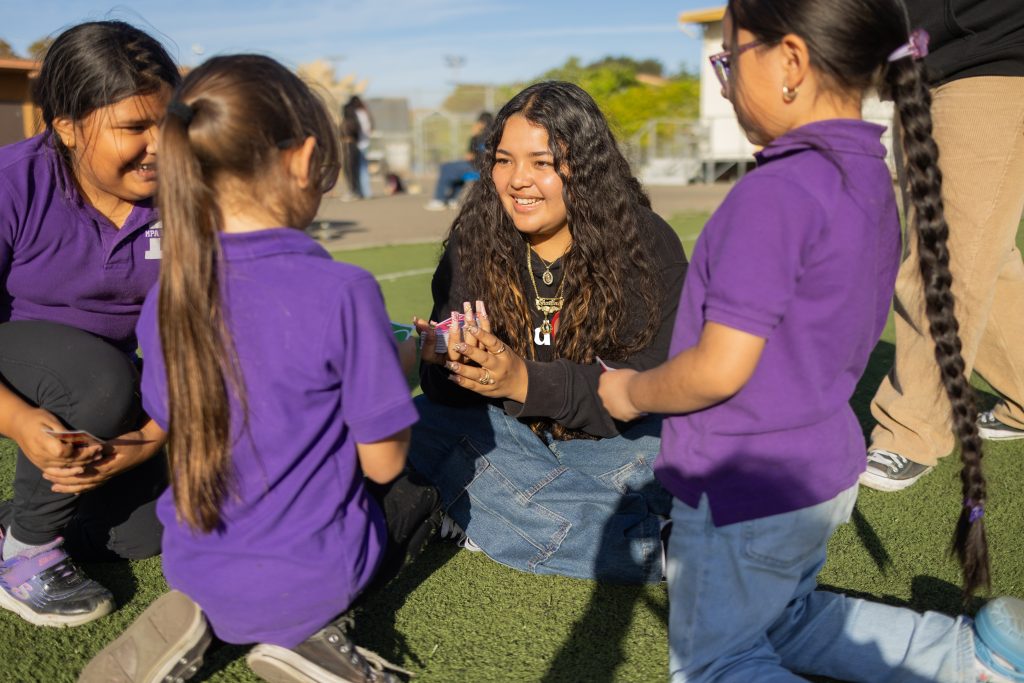buildOn students serve as mentors for younger students in their communities.