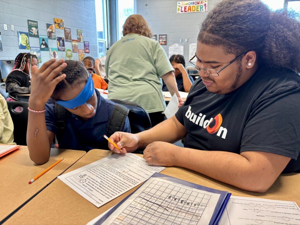 Trek students serve children around the world and in their own communities. In Detroit, buildOn students like Antonio (pictured right) tutor their younger neighbors.