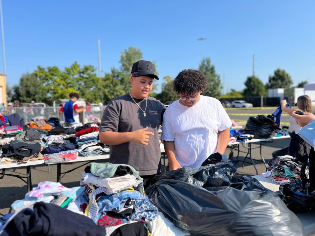 Thousands of buildOn students in Bridgeport are working to improve their city, like at this clothing drive.