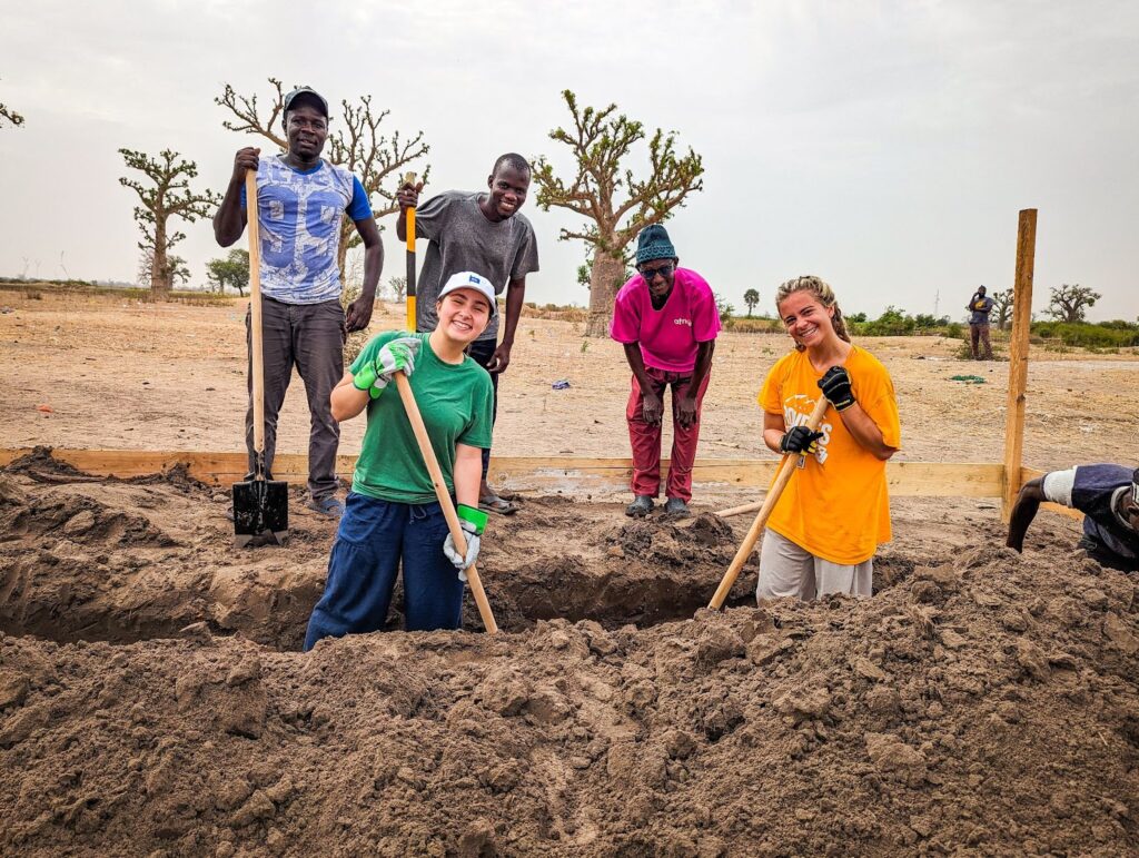 University of Tennessee students help dig the foundation of a new school in Ngomeme, Senegal.