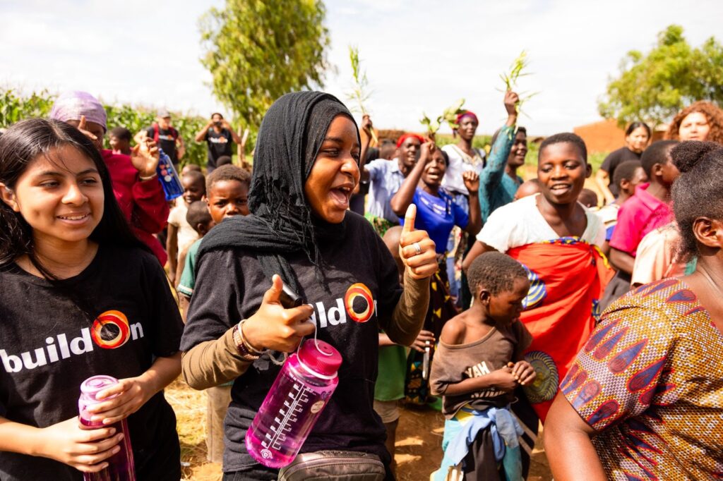 Aissatou (center) and Jackie (left) came all the way from the South Bronx to Malawi to continue serving others.