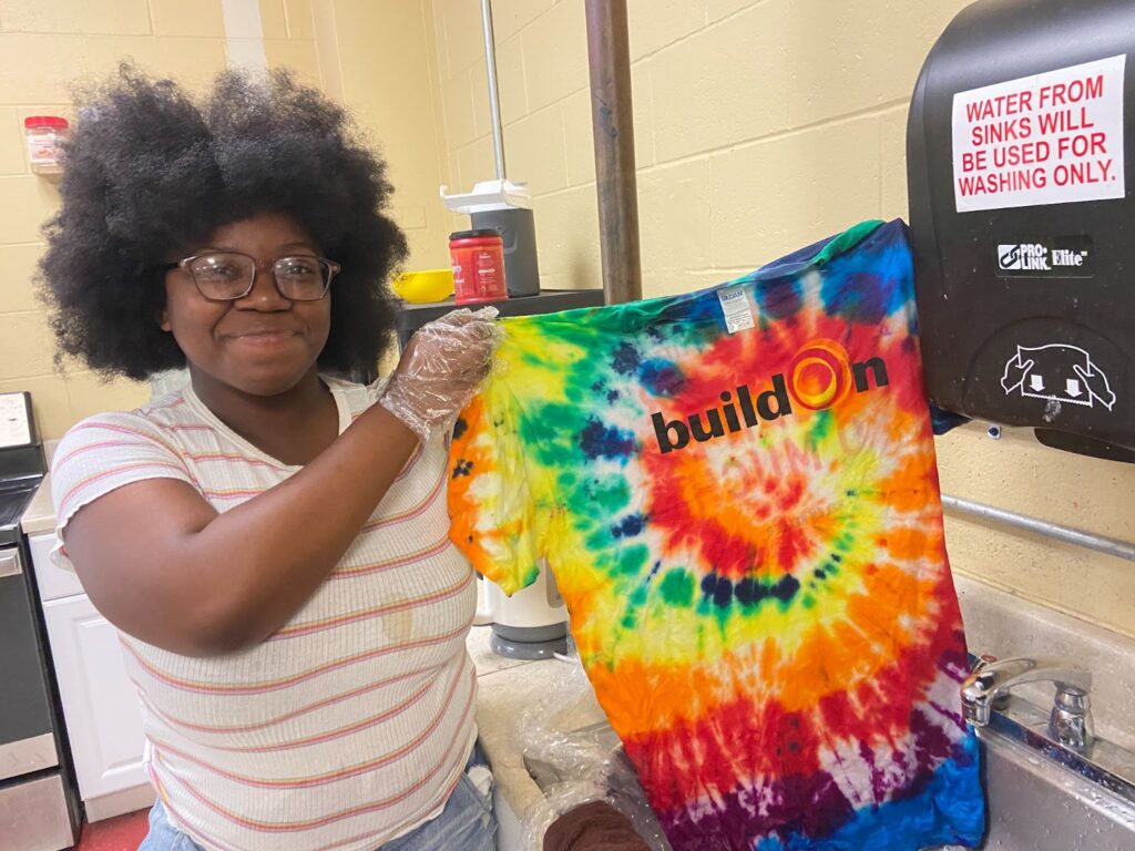 buildOn students at CASH high school in Boston celebrate Pride Month by making tie-dye buildOn shirts.
