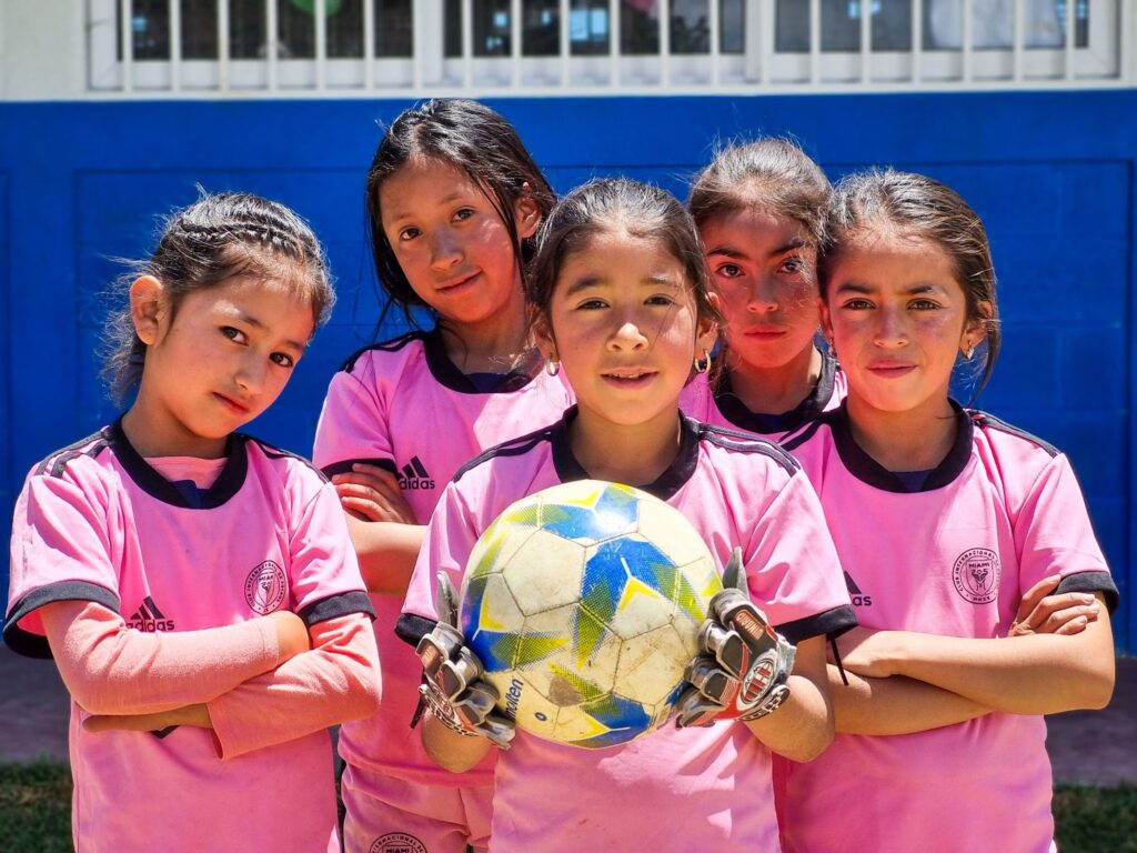 Maylin Joesli Alba, pictured here with her teammates, found purpose in soccer and returned to the classroom.