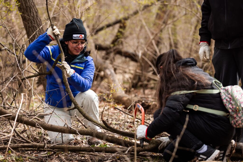 buildOn students in Chicago help improve the environment at a woodland restoration day.