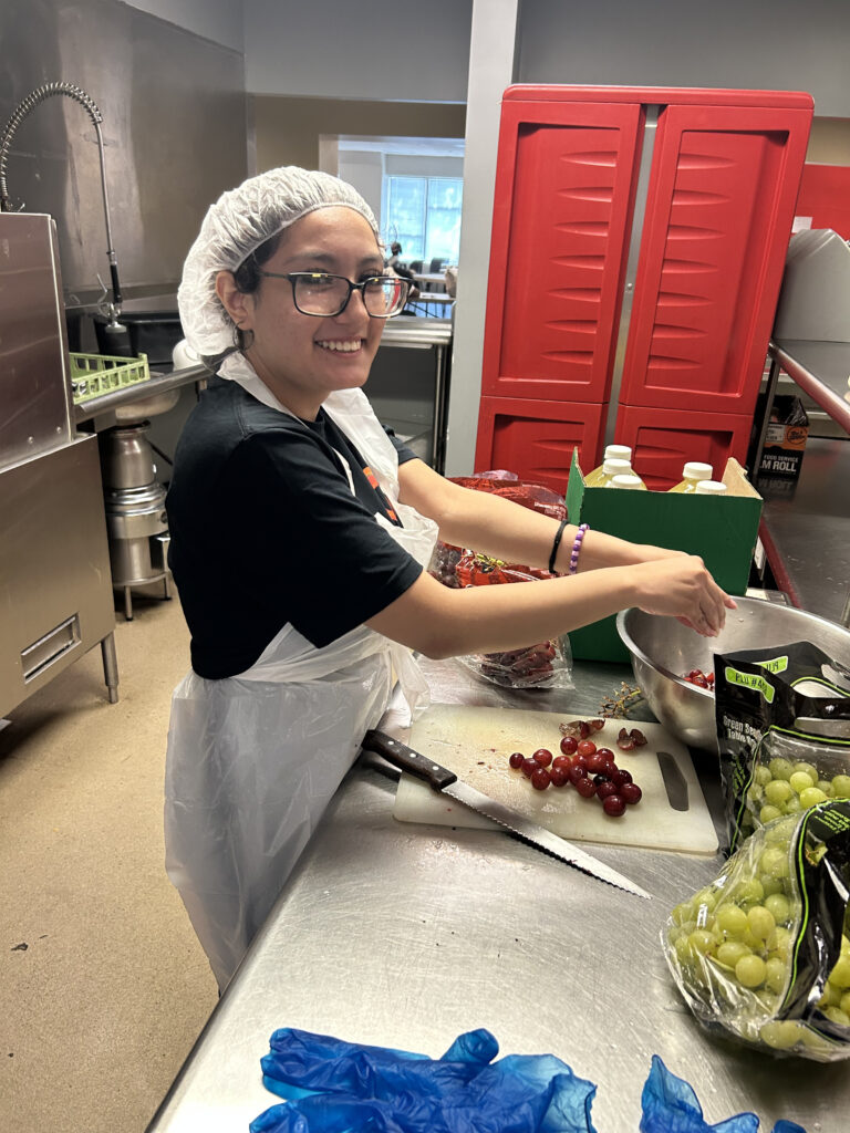 One of the highlights of summer service for buildOn in Chicago students was preparing and serving a meal at Breakthrough Men’s Shelter.