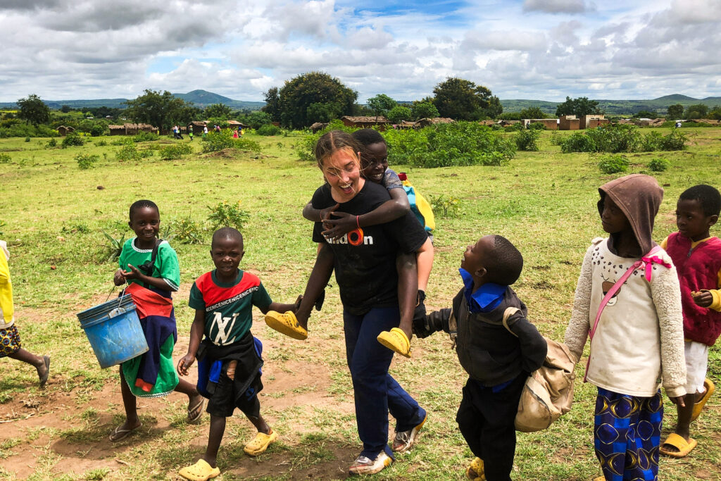 Alyssa connects with local children on her Trek to Malawi.
