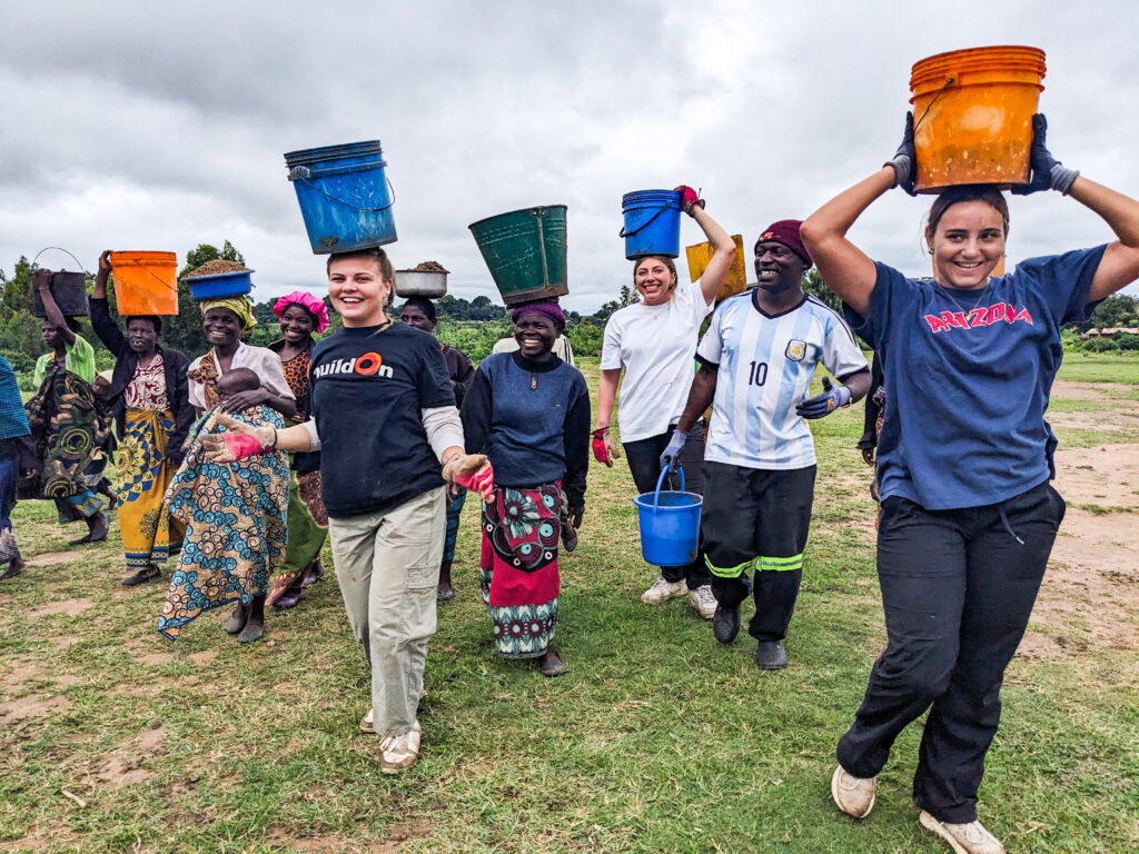 While on Trek, the Phi Beta Phi sisters helped carry water to make concrete.