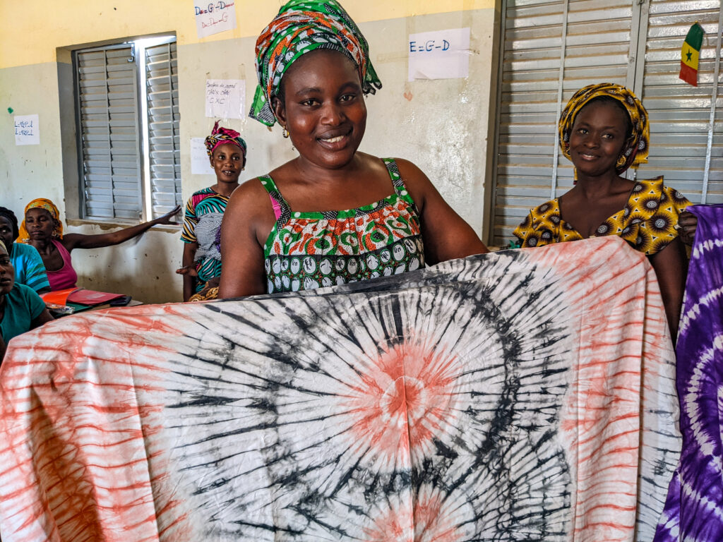 ALP participants used seed capital from buildOn to grow their businesses, like fabric making.