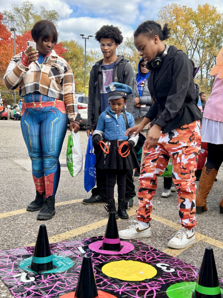 buildOn students help provide younger Detroiters with a safe place to celebrate Halloween.