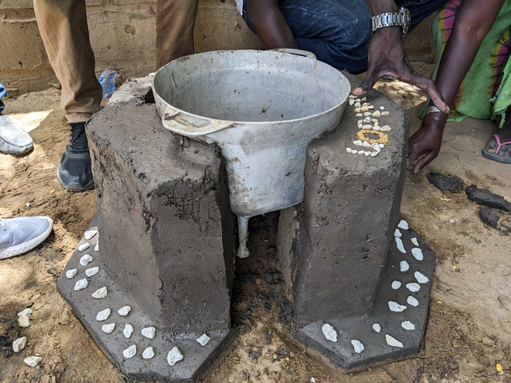 A finished stove. They help families save on firewood or charcoal expenses, reallocating funds for other needs.