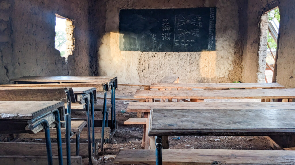 Students struggled to learn in the cramped, crumbling classroom.