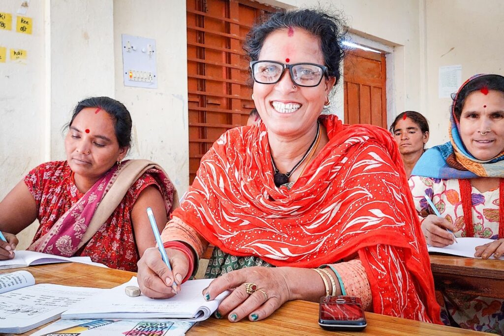 Through our Adult Literacy Program, parents and grandparents learn critical skills in the same classrooms as their children and grandchildren.