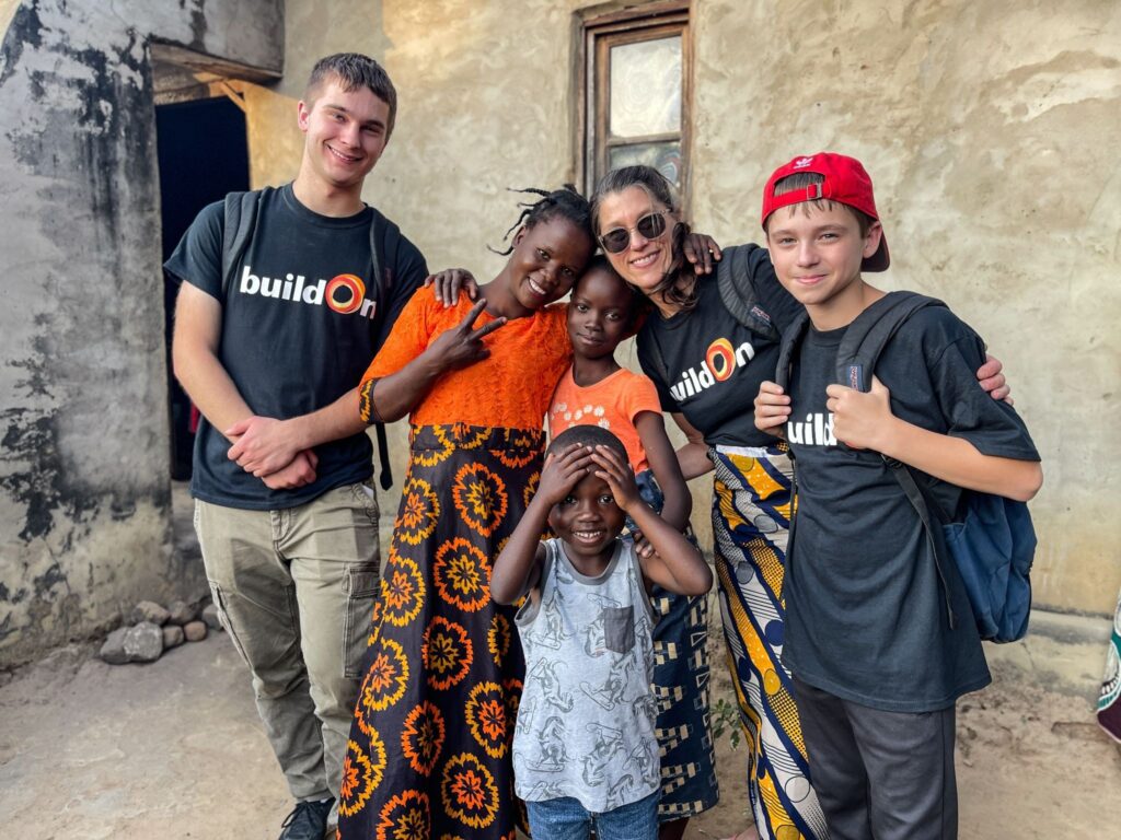 Trek participants with local kids in Malawi.
