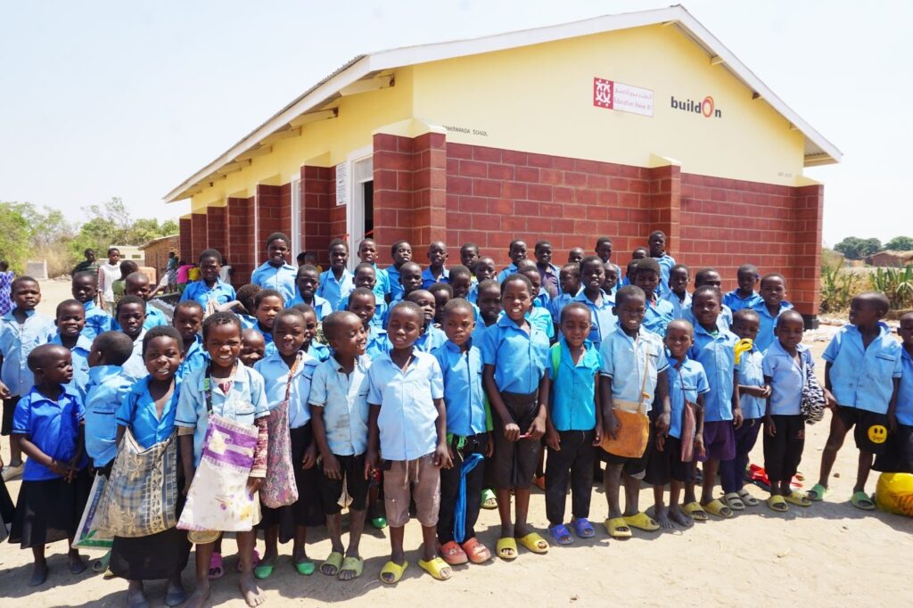 Children in Chimbwanda in front of their brand new school.