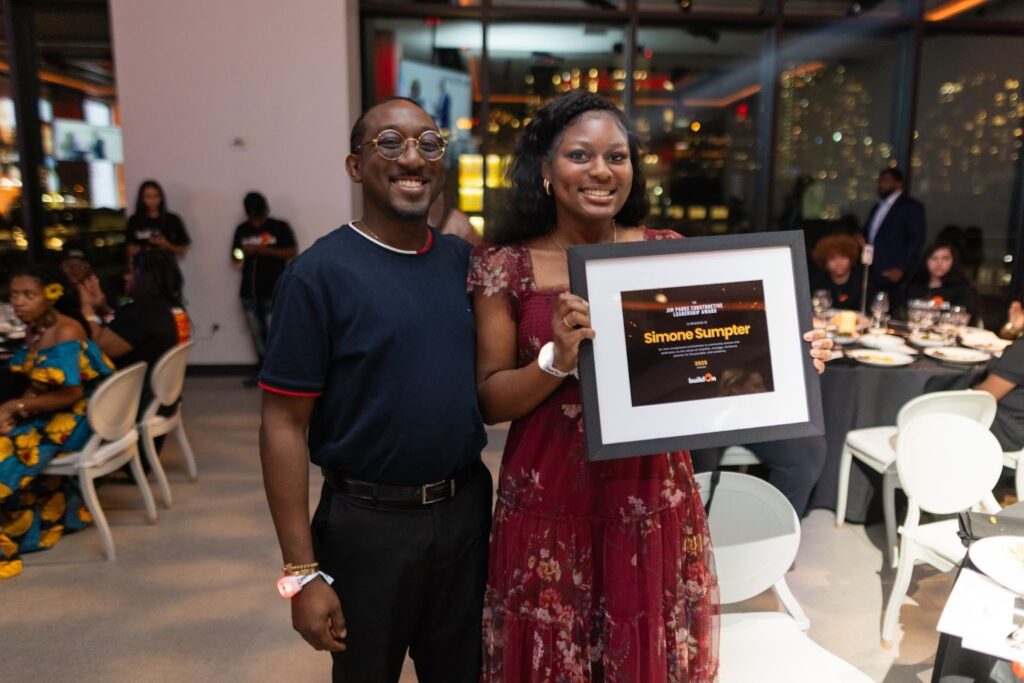 Simone receives her award at our annual Gala in New York with her proud father.