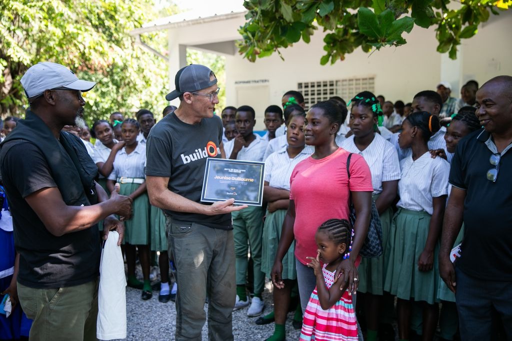 buildOn’s founder and CEO Jim Ziolkowski travelled to Haiti to give Jeunise the Britta and Denis Nayden Ignition Award.