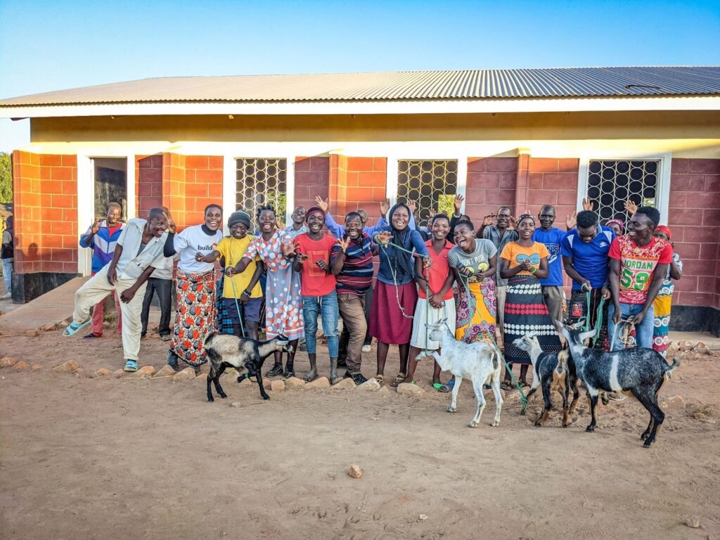 Students in buildOn's Enroll Program were given goats that they could breed and sell to provide crucial income to support their education.