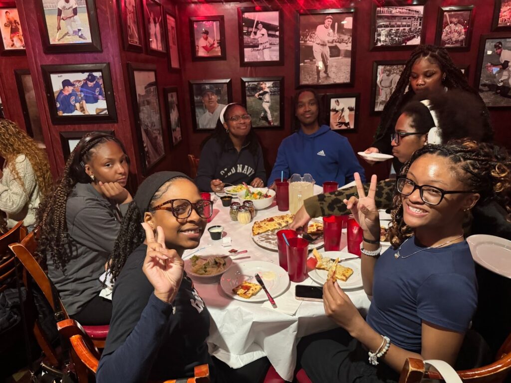 For many students, the highlight of the trip was simply getting a chance to connect with one another, such as here, when they tried Chicago-style deep dish pizza for dinner.