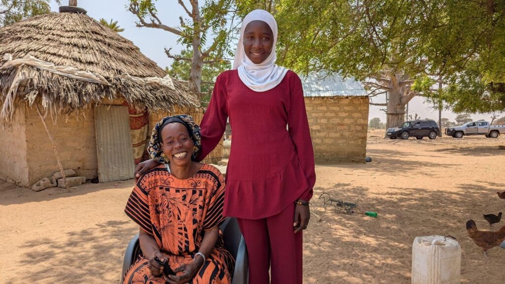 Ndiougue with her mother, Bigué Faye.