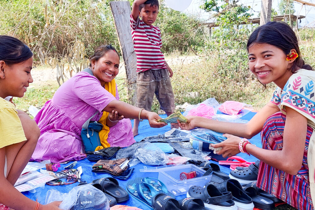Learning to read and write helped Mishara gain the confidence to start her own business.