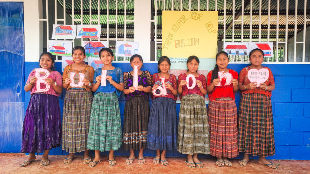 Students stand in front of their new buildOn school. By building a school in Guatemala, you will truly change lives!