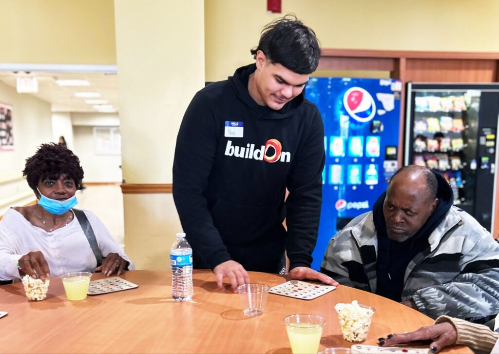 In Chicago, buildOn students serve seniors at RYZE West Nursing Home.