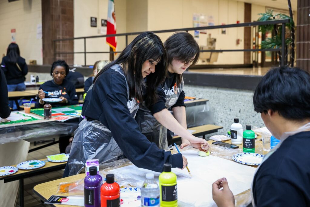 buildOn students create mural boards to uplift the Pilsen community.