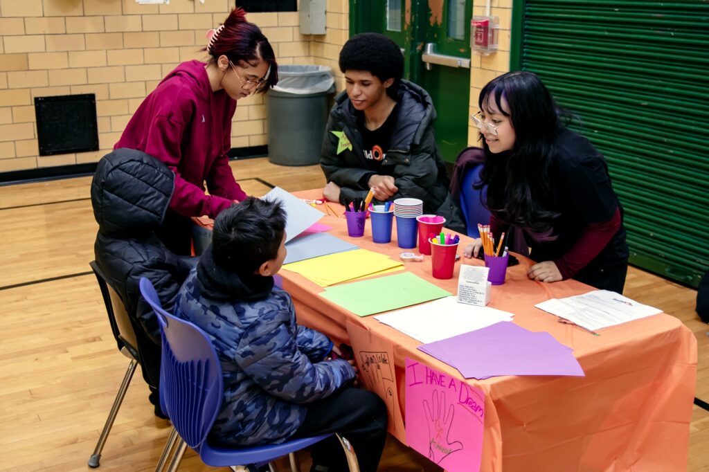 buildOn in the Bronx students host an MLK Day resource fair for local families.