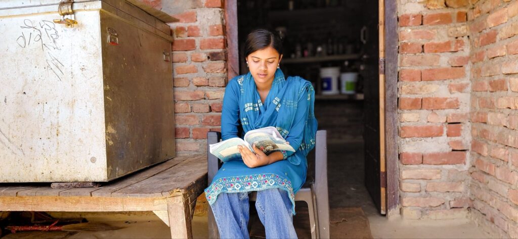 Afrin studies hard and dreams of becoming a teacher.