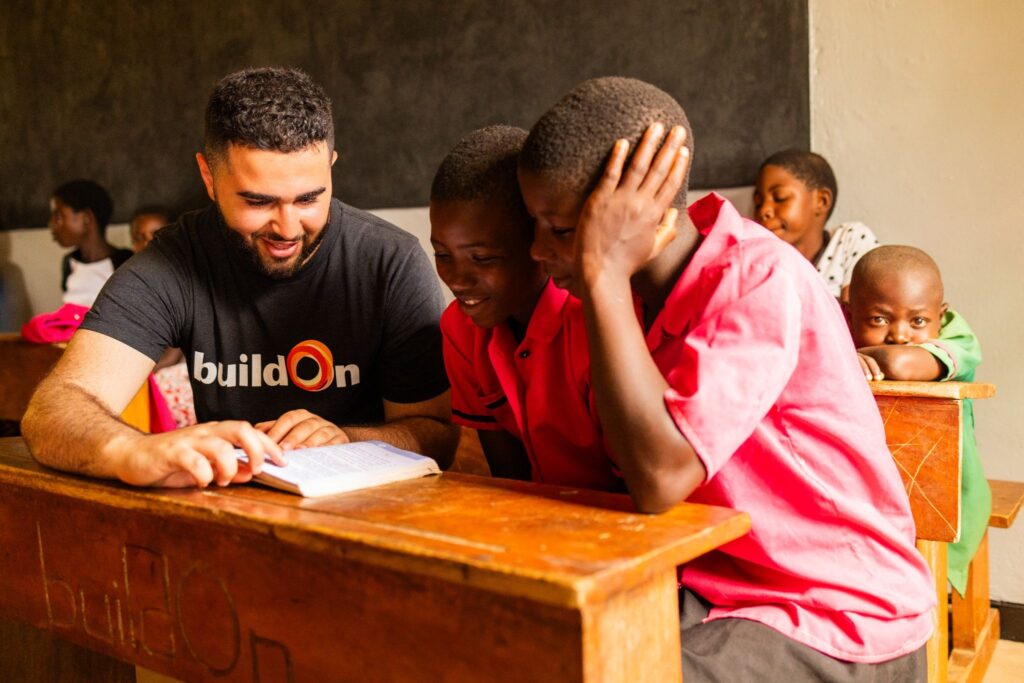 A Trek participant visits a completed school in Malawi.
