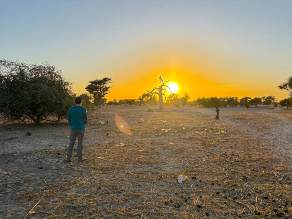 Will Kievit appreciates a sunset outside of Loukouk.