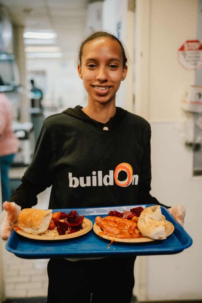 Ashley serves her neighbors at Part of the Solution.