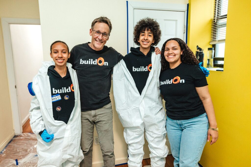 Ashley at service with buildOn Founder and CEO Jim Ziolkowski.
