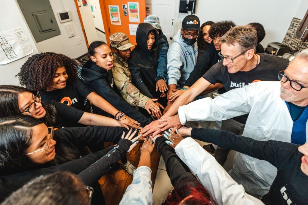 Through buildOn, Ashley (top left) found her passion for service.