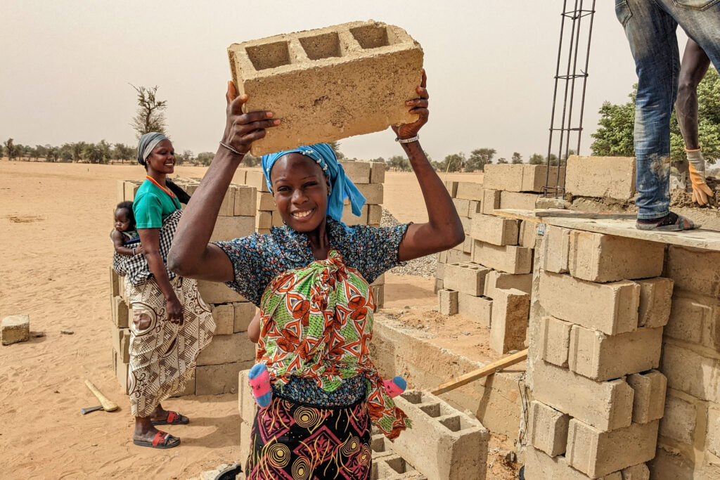 Women play an equal role in the leadership and construction of buildOn schools.