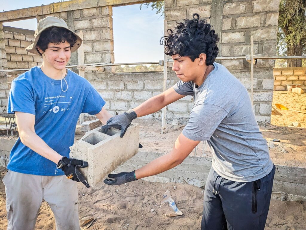 Members of the East Hampton Trek team hard at work in Daara, Senegal.