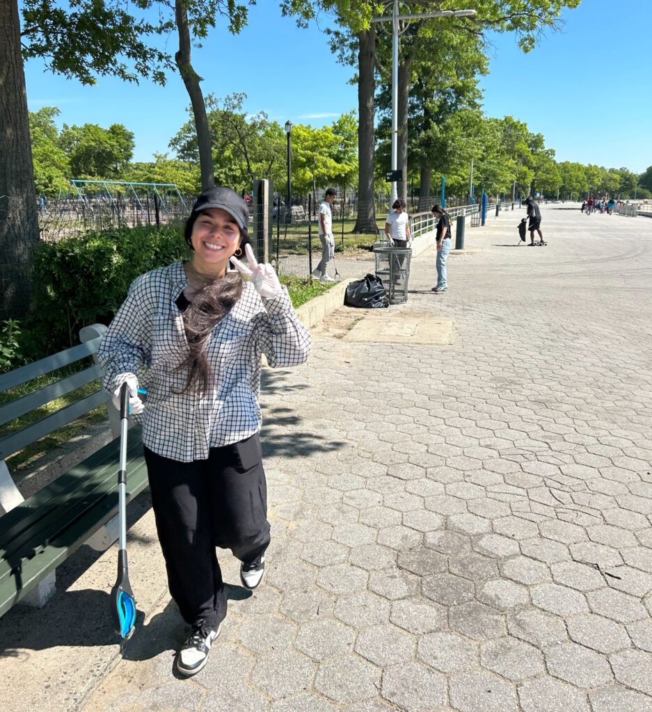 Myess Hammouri at a park clean-up in the Bronx.