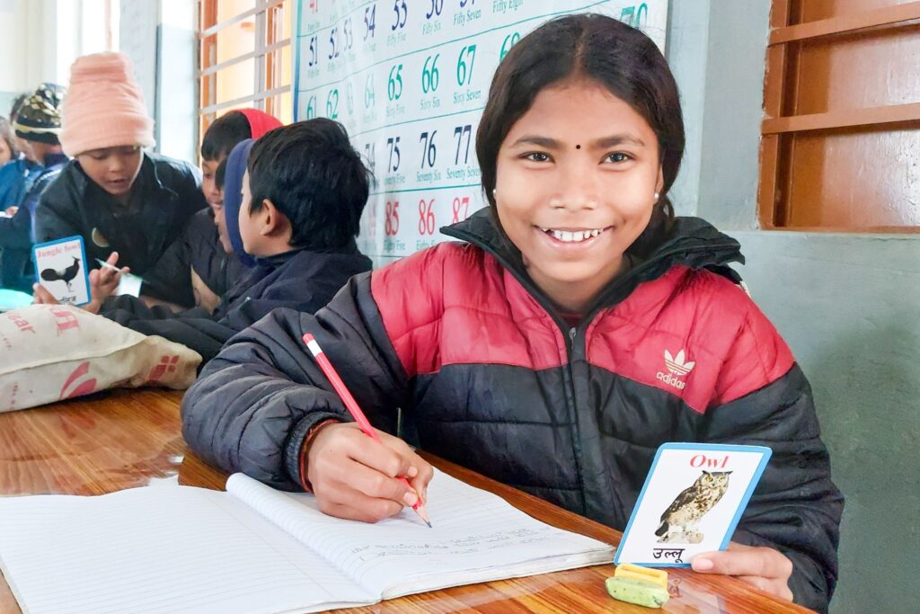 Monika learning English at a local buildOn school.