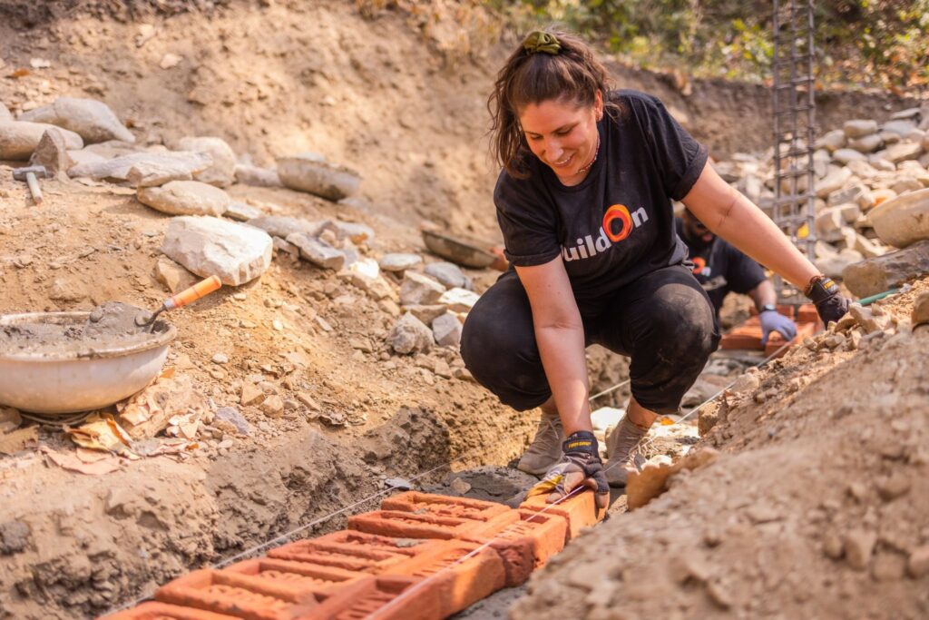 A Trek participant on the worksite in Nepal.