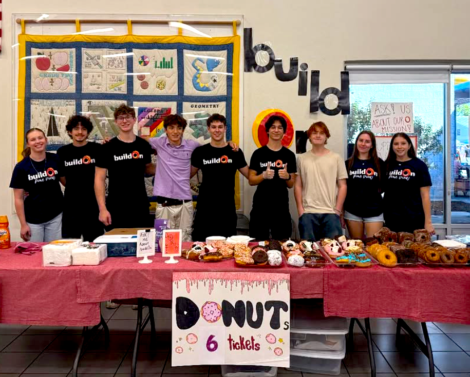 The Pine View Trek team holds a donut sale to help fundraise for their Trek.