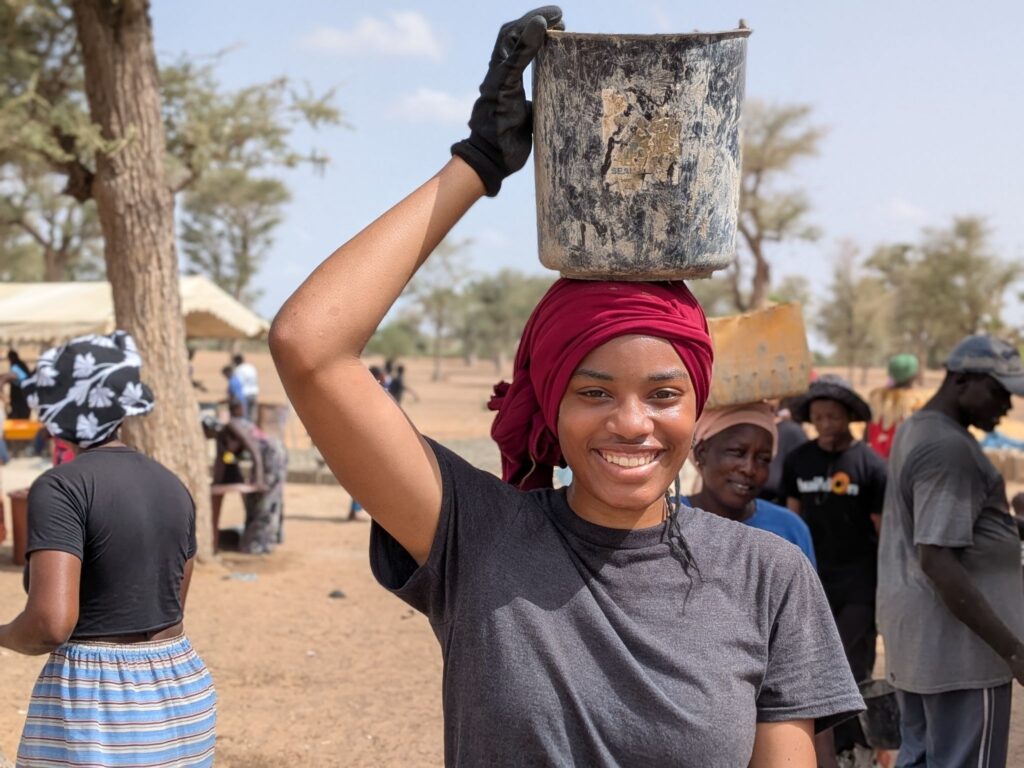 Southeastern High School of Technology and Law student Lashontique Stokes on the worksite in Senegal.