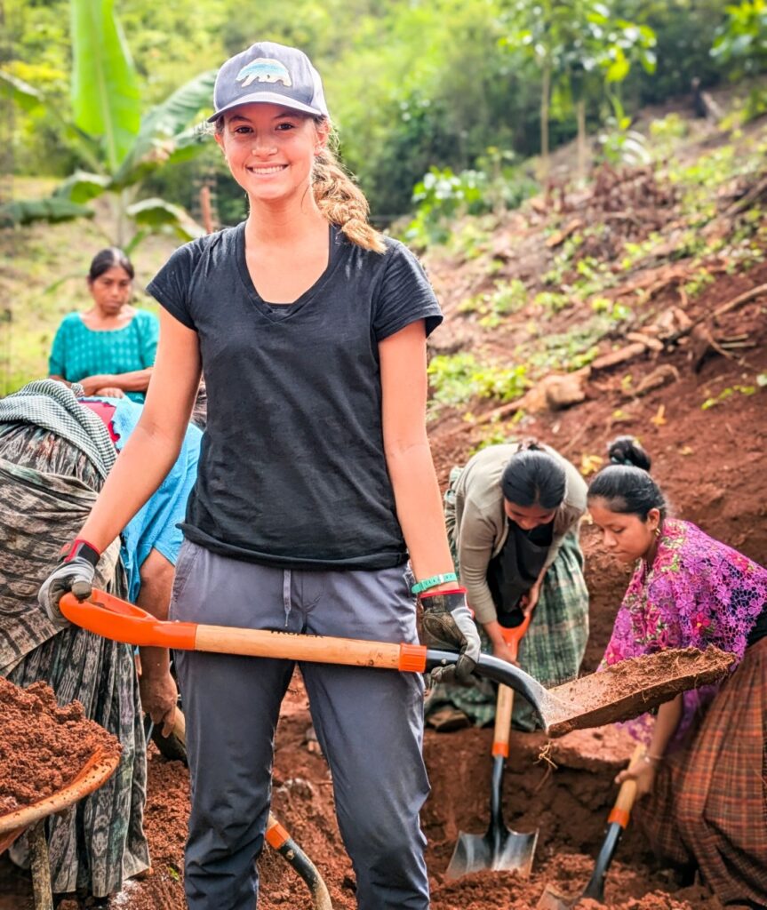 A Trek participant on the worksite in Parcelamiento Agrario El Recuerdo La Catarata, Guatemala.