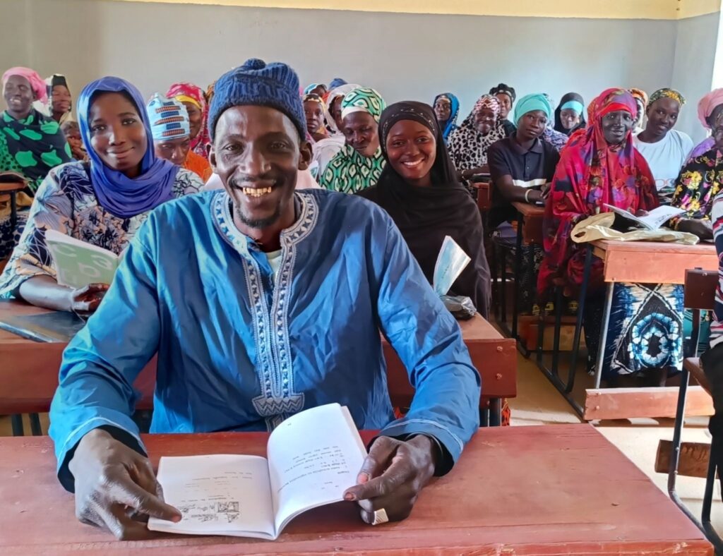 Mouhamadou with his Adult Literacy class in Togo, Mali.
