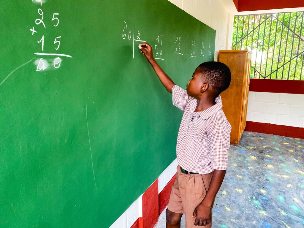 A student in a new buildOn school in Fonds Tortue, Haiti.