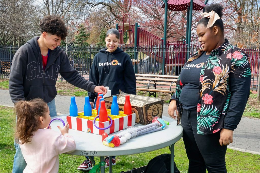 buildOn in the Bronx students serve at an annual spring egg hunt.
