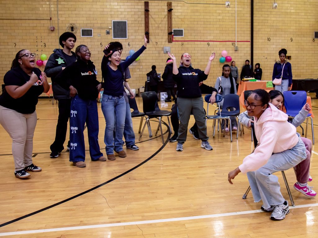 buildOn students in the Bronx serve together at an MLK Day community fair.