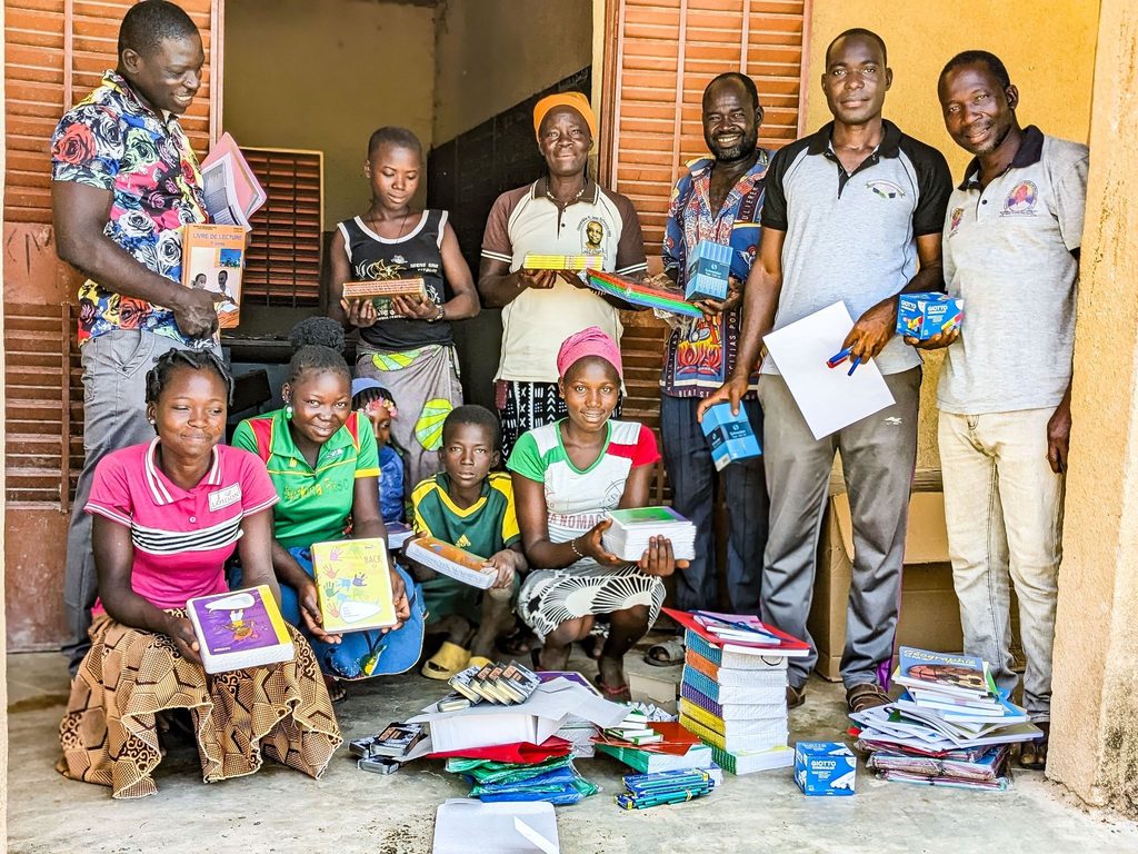 Students receive school supplies in Yezouanga, Burkina Faso as part of buildOn’s Enroll Program.